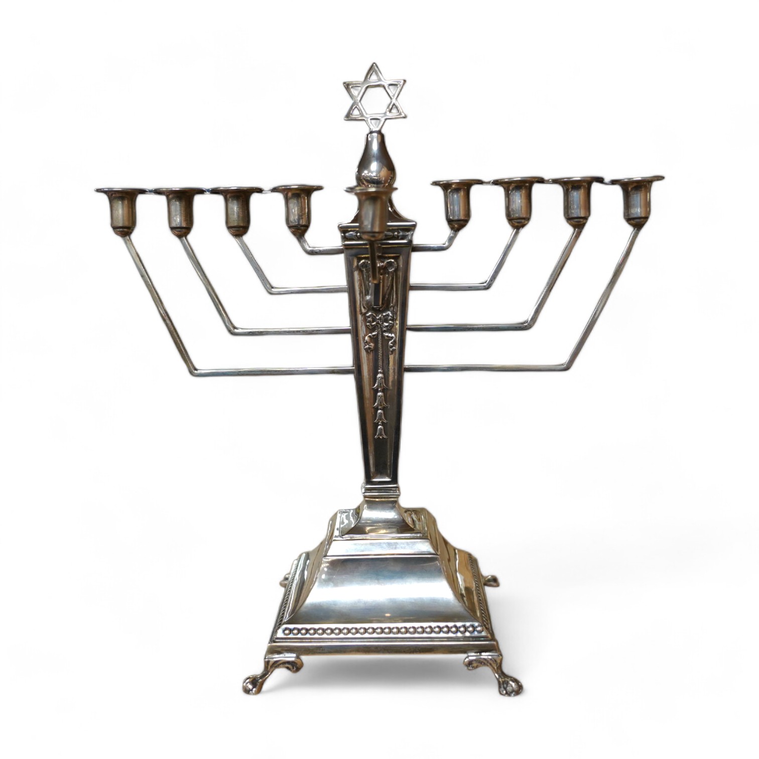 A modern silver Hanukkah Menorah, on a square base with four claw and ball feet, by Alexander Smith, Birmingham, 1967, height 27.6cm, weighted. Condition - fair to good